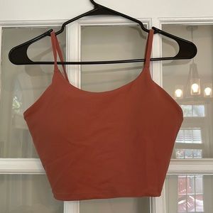 Size M Paragon fitwear athletic crop. Color looks more accurate in 2nd photo